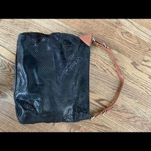 Sorial snake like black leather bag